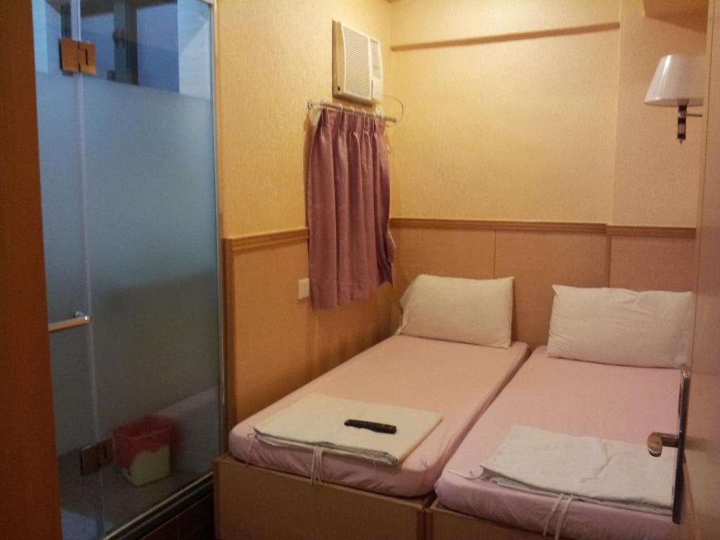 New Garden Hostel Hongkong Rum bild